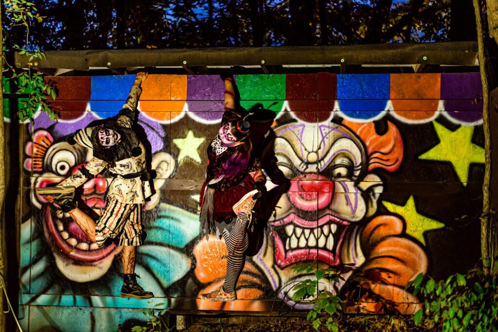 Circus clowns hanging on a wall
